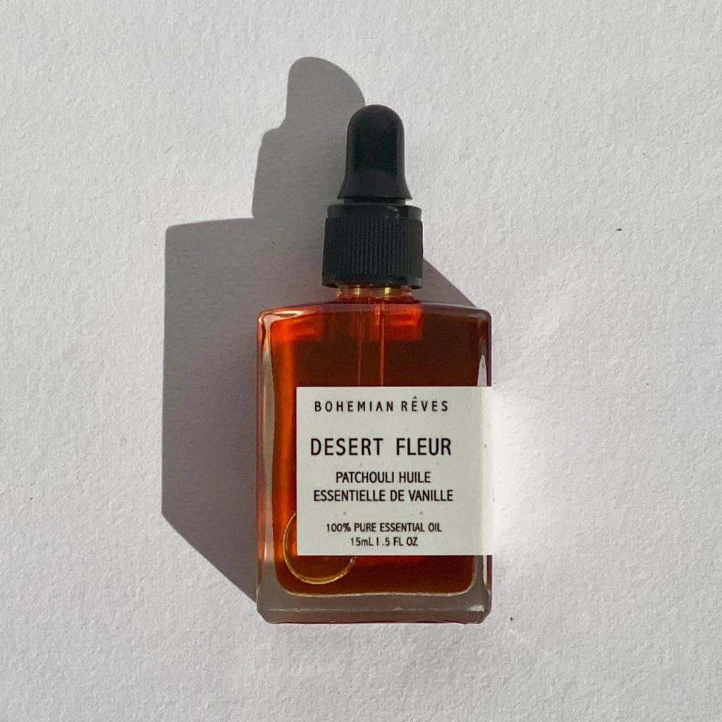 a bottle of desert fleur on a white background