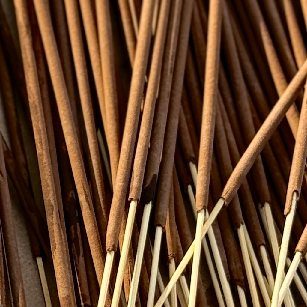 Close-up of Bohemian Rêves Incense Sticks, showing natural texture and detail of hand-rolled botanical incense.